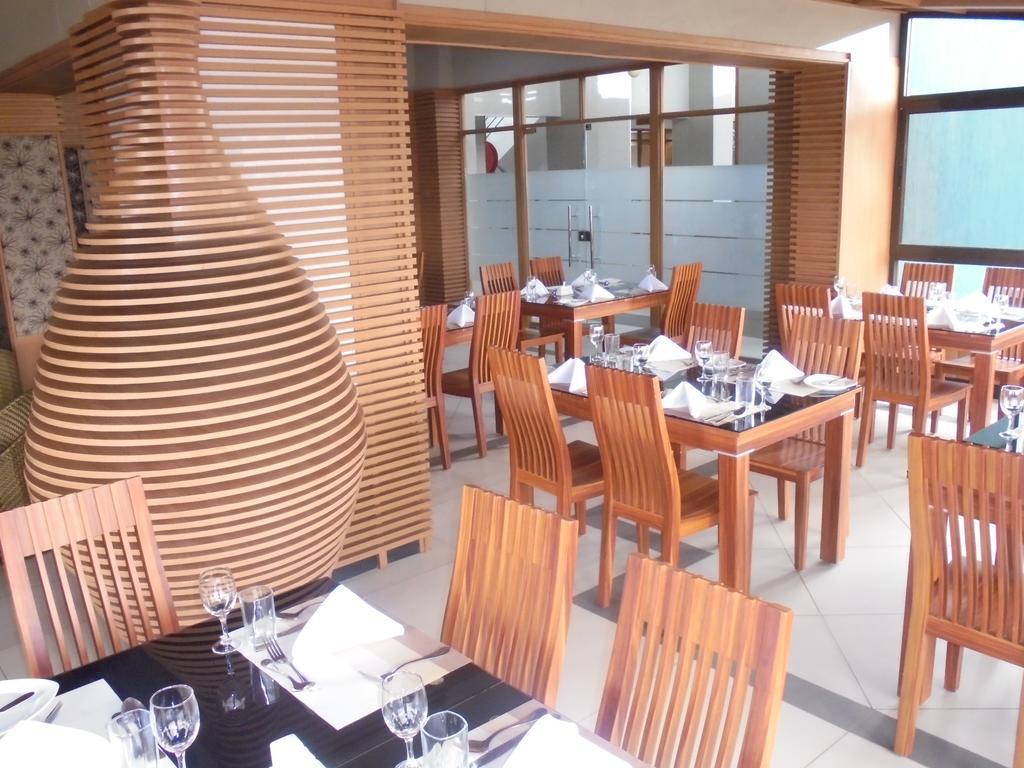 We Hotel And Suites Найроби Экстерьер фото